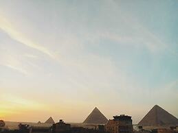 Nefertiti pyramids view -