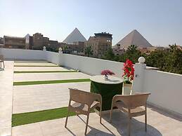 Nefertiti pyramids view -