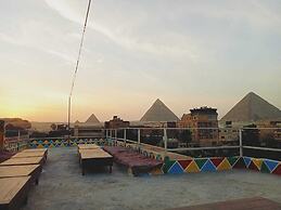 Nefertiti pyramids view -