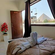 Nefertiti pyramids view -
