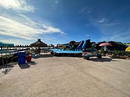 Gorgeous Beachfront Gem With Water Slides