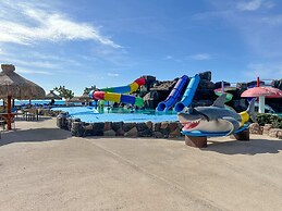 Gorgeous Beachfront Gem With Water Slides