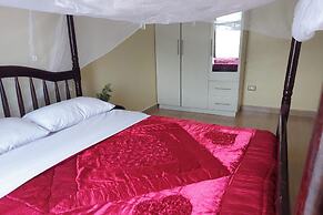 Cozy 2-bed Apartment in Akright City, Bwebajja