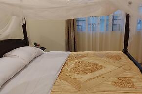 Cozy 2-bed Apartment in Akright City, Bwebajja