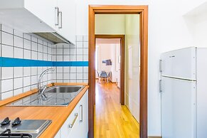 San Luigi Cozy Flat - Private Parking