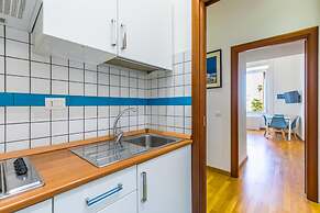San Luigi Cozy Flat - Private Parking