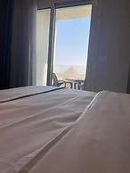 pyramids grand museum inn