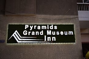 pyramids grand museum inn