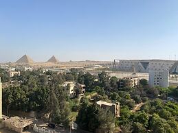 pyramids grand museum inn