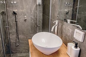 Gabriel Apartments - Stone Suits JEM City Center